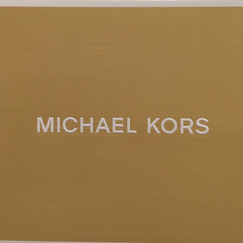 MK Snake Print Moccasins